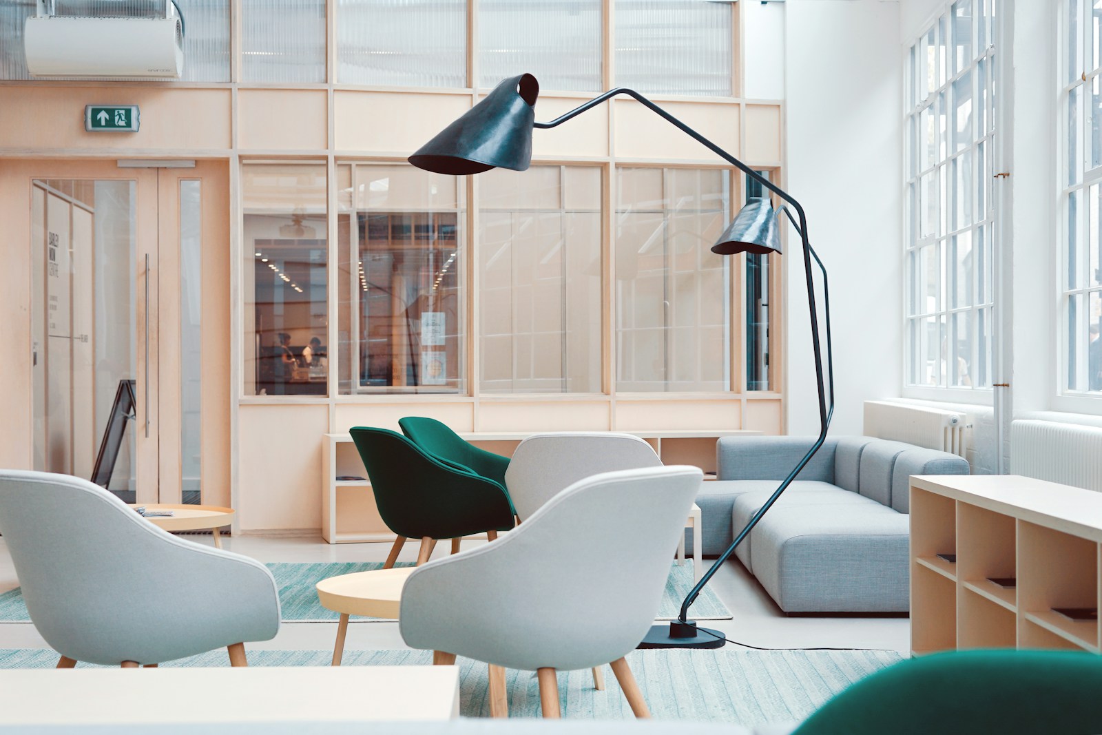 A bright room with chairs around a small table, ready for conversation.